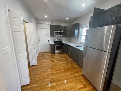 65 Lucerne St unit 2, Dorchester Center, MA 02124 - photo 2
