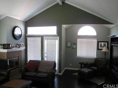 Great-room has vaulted ceilings walnut floors, gas