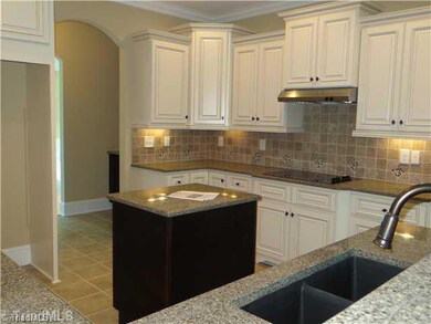 Kitchen. Spacious Kitchen with Eat-In Bar & Island