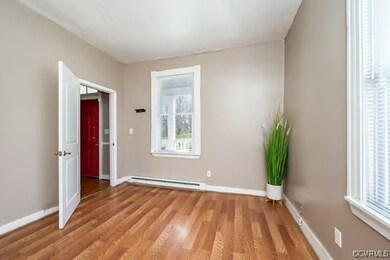 Spare room featuring a wealth of natural light, a