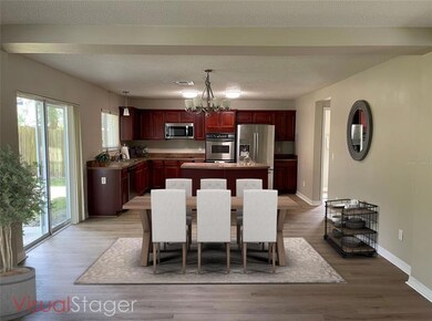 Downstairs eat-in area, virtually staged