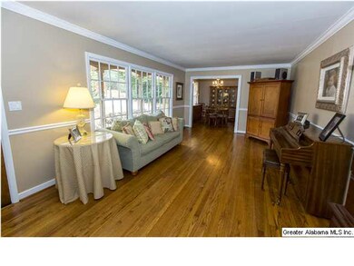 Formal Living Room With Beautiful Hardwood Floors