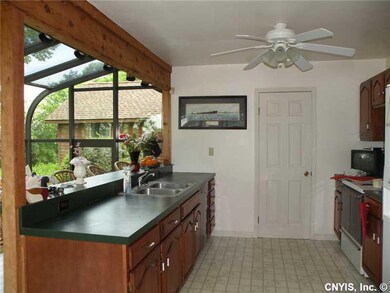 Kitchen. With sunroom attached.
