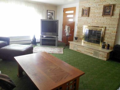 Living Room. The raised living room is two steps a