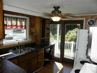 Kitchen. Sliding glass doors provide a lot of natu
