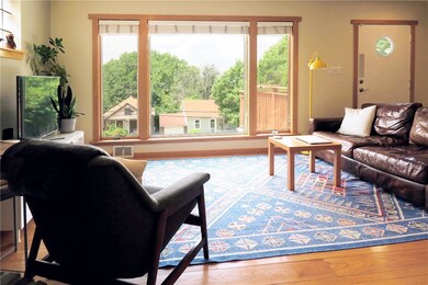 Living Room:  13x8, floor-to-ceiling window.