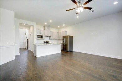 Kitchen featuring stainless steel appliances, dar