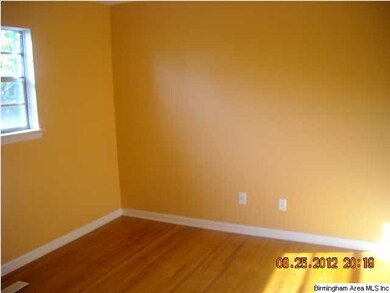 those hardwoods add charm to all of the rooms