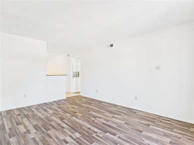 Unfurnished room with light wood-style flooring