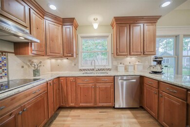 Kitchen has beautiful cabinets, stainless steel ap