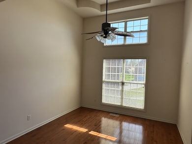 Formal dining room with trey ceiling.