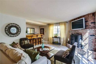 Family room with a bar area to the left