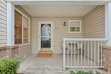 Covered private entry and patio.