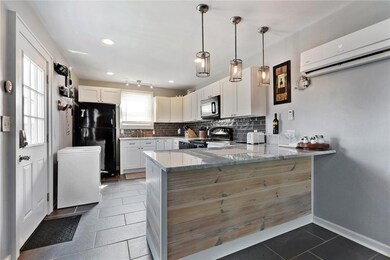 Downstairs Unit: View of kitchen.
