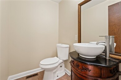 Powder room on main floor at entry