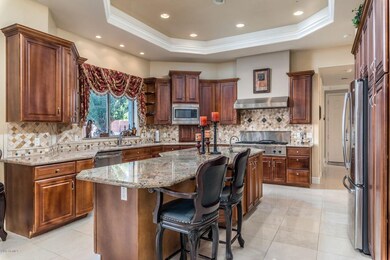 Granite Counters and Rich Cabinets