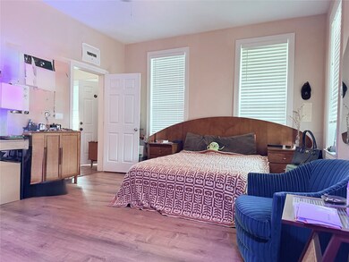 Spacious bedroom with great natural light — a peaceful retreat to unwind after a long day.