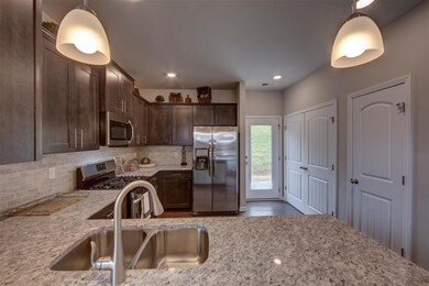 Lot's of granite!  Photo of decorated model home.