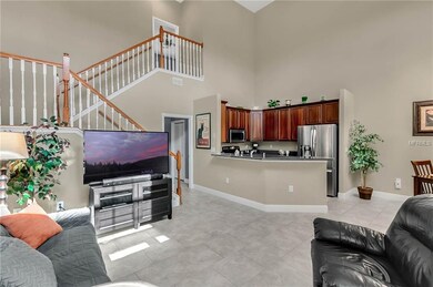 Family area with kitchen, dining, and second floor