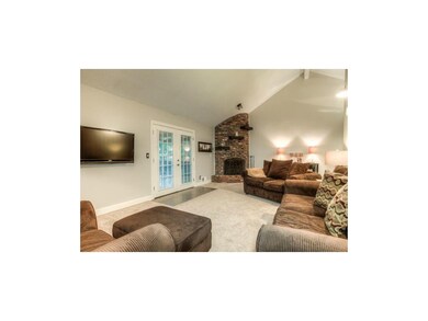 Recently updated living room with updated light fi