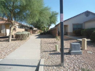 Walking path on East side of house