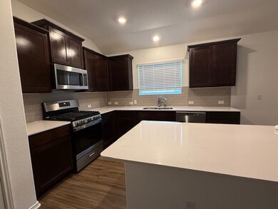 Light gray titled backsplash, Fridge to be include