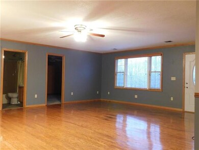 The very large living room area has enough space f