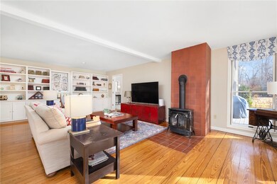 Bookcases and cabinets enhance the appeal of this