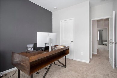 View of carpeted home office