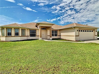 1252 Jaguar Blvd, Lehigh Acres, FL 33974 - photo 2