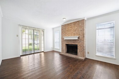 Unfurnished living room with brick wall, ornamenta