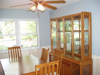 Separate Dining room with lovely view of deck and 
