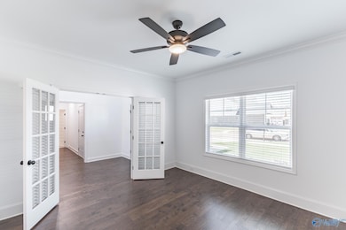 This room has a closet that was added for their needs.  If you have the back wall of the closet removed it walks into the kitchen/making this room more of a dining room.