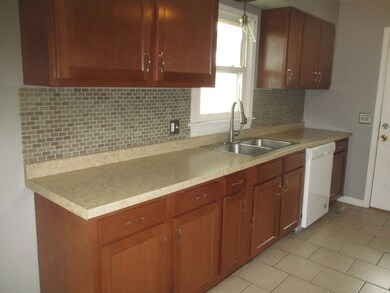 Equipped kitchen has new cabinets, counter tops an