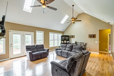 Fresh paint, vaulted ceiling and natural light flo