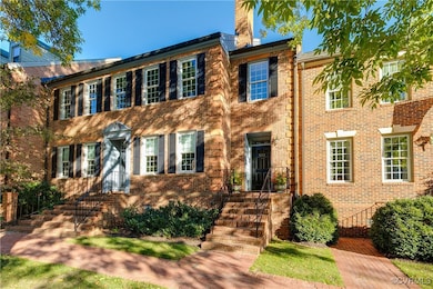 Private foyer with steps and elevator to 2nd floor