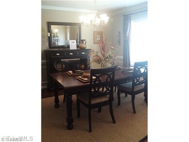 Dining Room. This is a decorated model of the Vivian floor plan and not the actual home. Decorative paint, home decor and furniture is not included in actual home. To demonstrate the floor plan only.