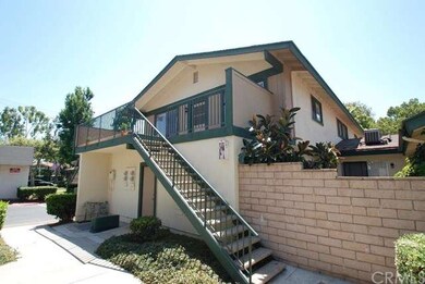 Desirable End Unit with private patio.
