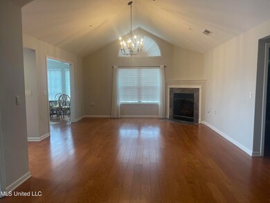 Hardwood floors throughout condo