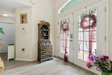 Enter through the double doors into the Foyer