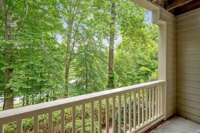 Lochmere Lake view with mature trees.