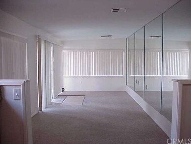 Looking from the kitchen into the large, open family room