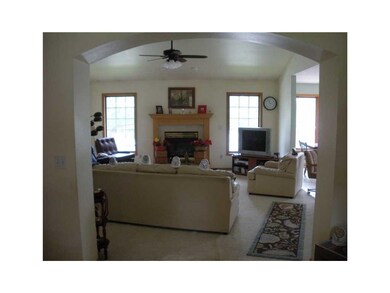 Living Room. Note Archway
