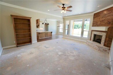 LOOKING FROM THE ENTRY INTO LIVING, DINING AND ISLAND IN KITCHEN.  THE BOOKCASE CAN BE MOVED,  IT IS NOT ATTACHED.