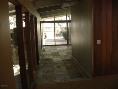 VIEW FROM LIVING ROOM TO FAMILY ROOM