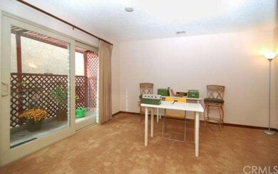 Den or Family room with access to patio.