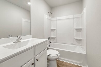 Secondary Bathroom comes with a shower and tub combo