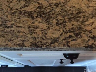 New cabinets, hardware and granite counter tops.
