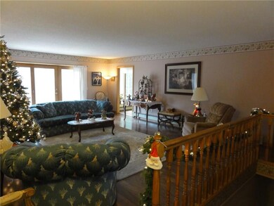 Living room with patio door and...