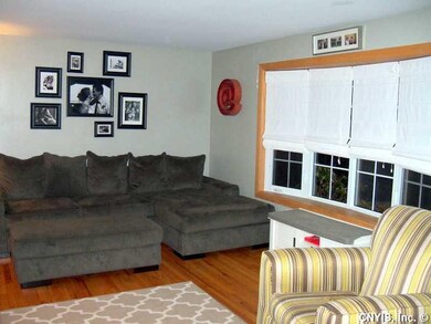 Family Room. Hardwoods and beautiful bay window.